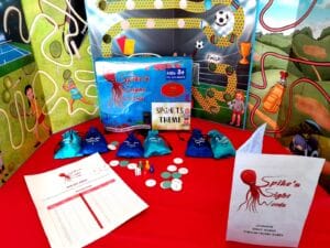 Spike's Sight Words Games on a table with a red cover