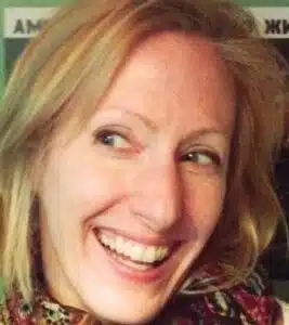 Scotti McLaren a woman with blond hair, smiling at the camera